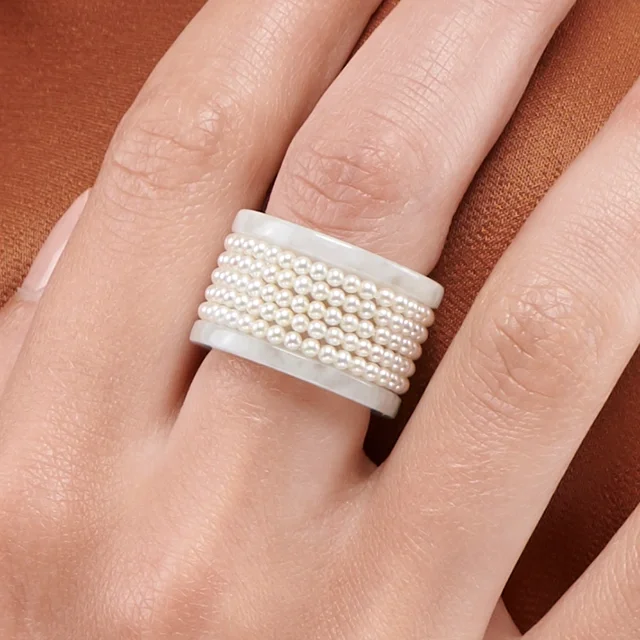 Close up of Blue Lotus Jade Natural Pearl Wide Band